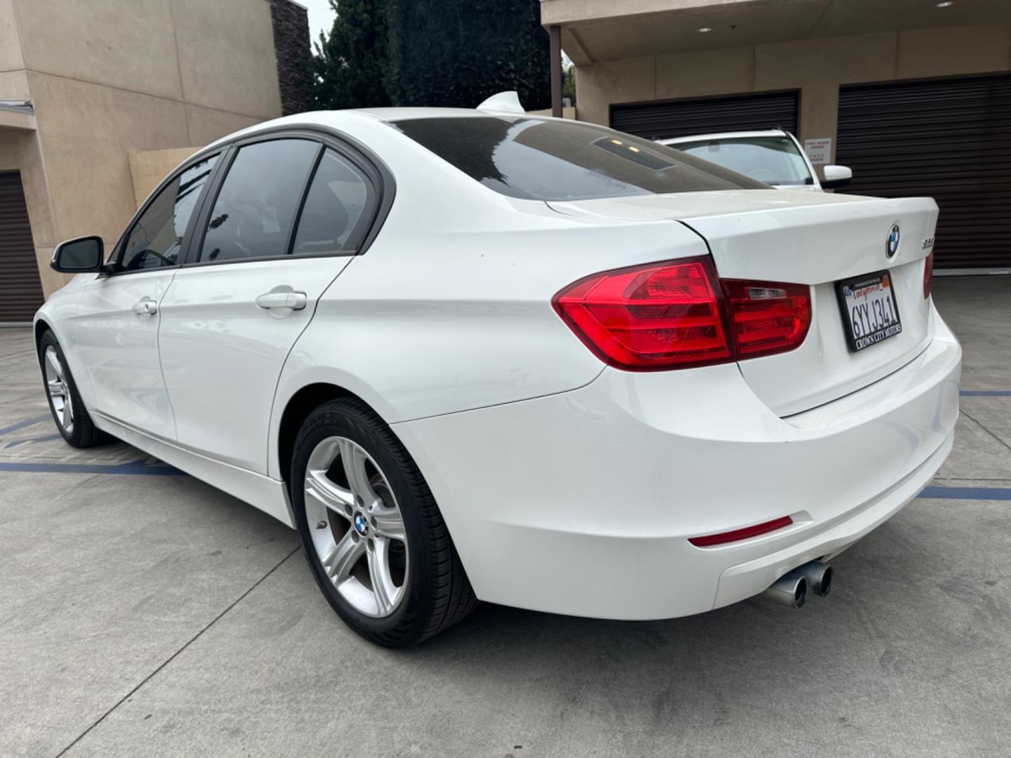 2013 White BMW 3-Series 328i Sedan (WBA3C1C52DF) with an 2.0L L4 DOHC 16V engine, AUTOMATIC transmission, located at 30 S. Berkeley Avenue, Pasadena, CA, 91107, (626) 248-7567, 34.145447, -118.109398 - Crown City Motors is a used “Buy Here Pay Here” car dealer in Pasadena CA. “Buy Here Pay Here” financing, means that when you purchase your vehicle from our dealership, that you make the payments to the dealership as well. We do not need the banks approval to get you approved for a used auto - Photo#4